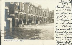 This terrace of houses in Wanstead Park Road, which backs on to the River Roding, were also flooded out. The postcard was written on July 1st, 1903