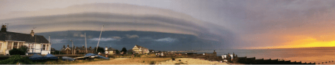 shot taken by Richard Dixon in Whitstable, Kent. It shows, perfectly, the contrast betweeen the bright orange sunset and the impending doom of the approaching MCS from the continent