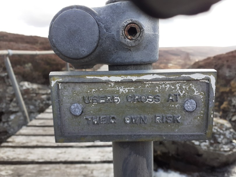 A rickety bridge spans the River Eidart - some of the wooden slats have seen better days